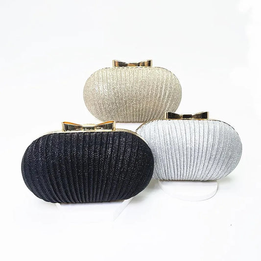 Elegant Shiny Metal Bow Buckle Hand Bagz